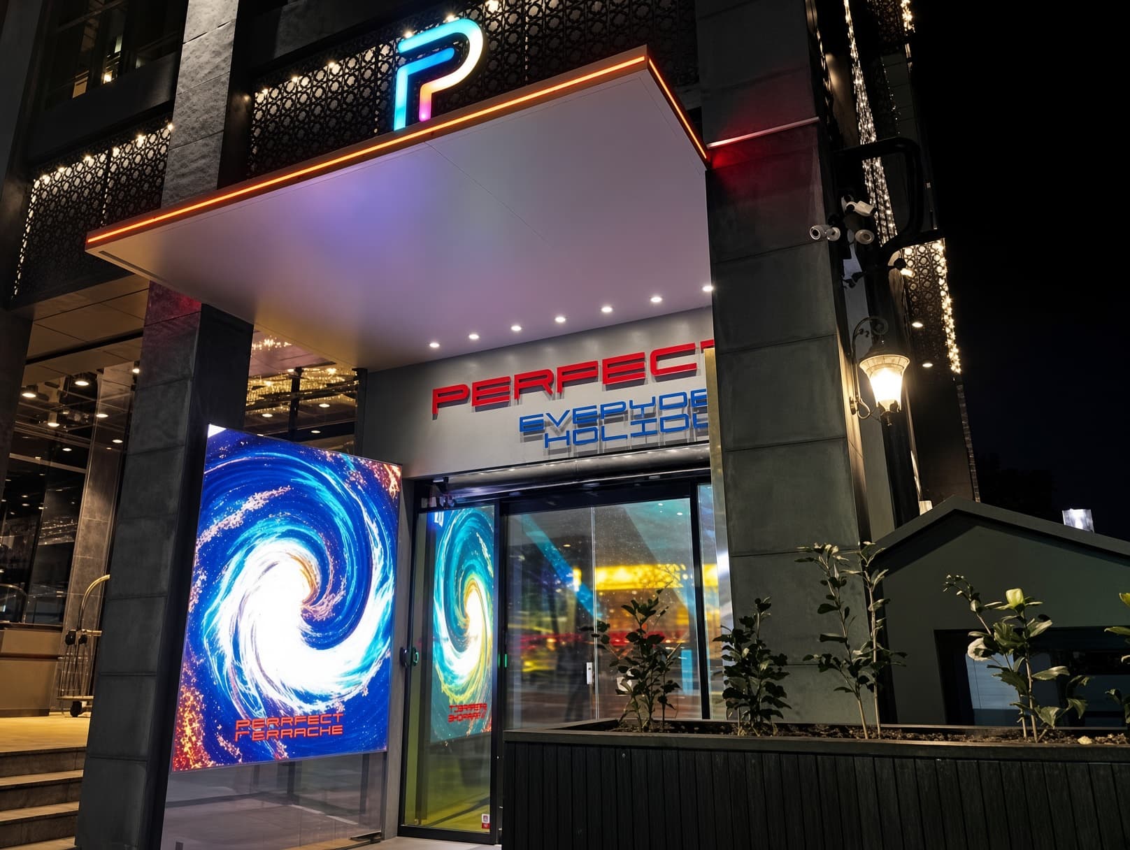 カンナム・デザート (강남 디저트) · PERFECTの文字がある入口の横に、青い渦の映像の画面が見えます。